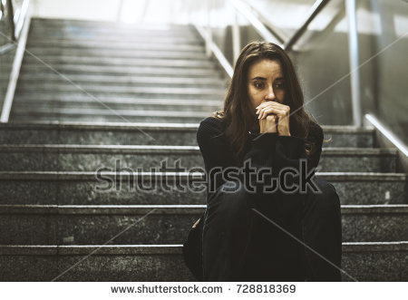 stock-photo-adult-woman-sitting-look-worried-on-the-stairway-728818369